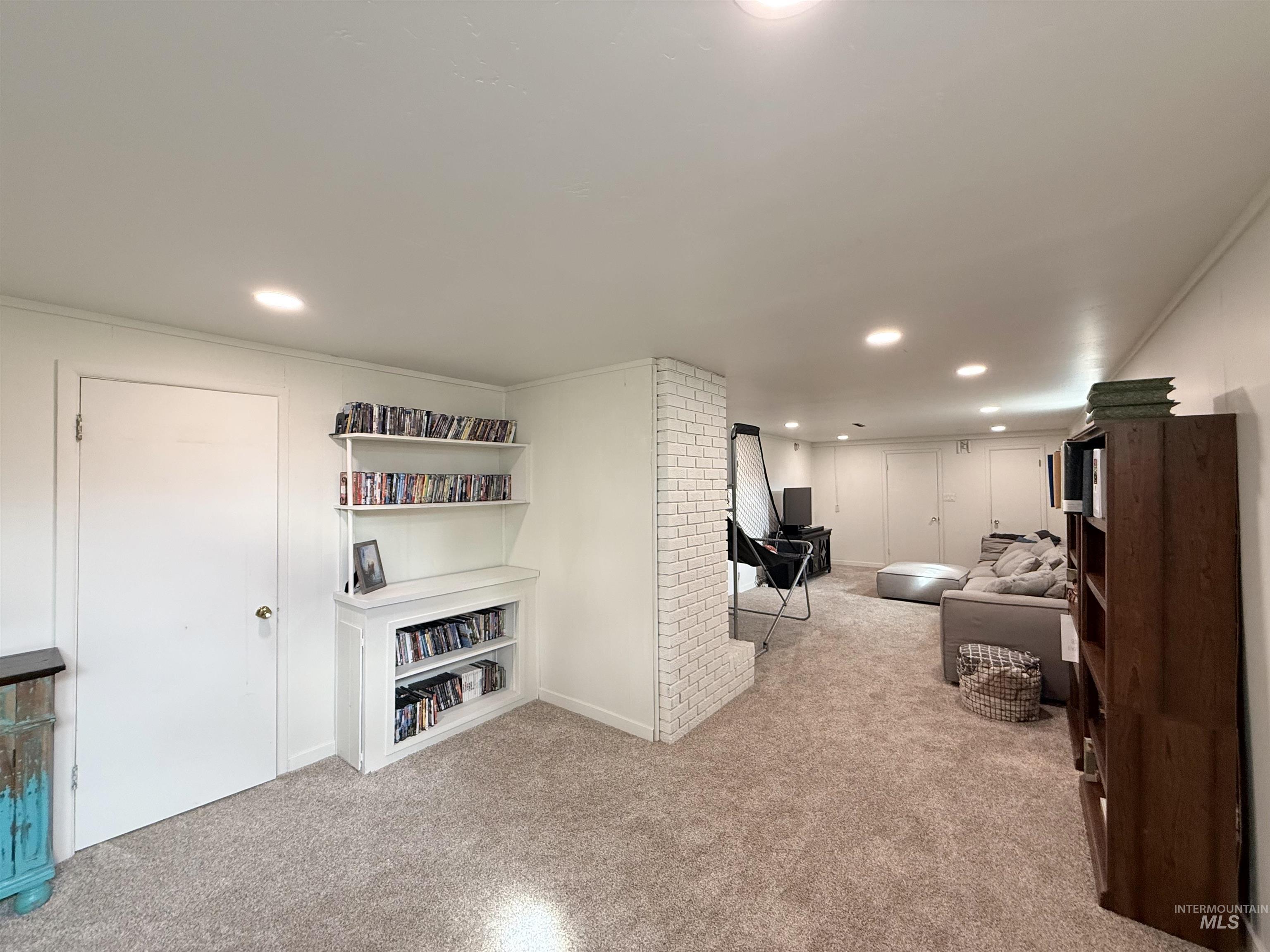 624 20th Street Rupert, ID 83350 - Photo 24 of 31 Living area with light carpet and recessed lighting