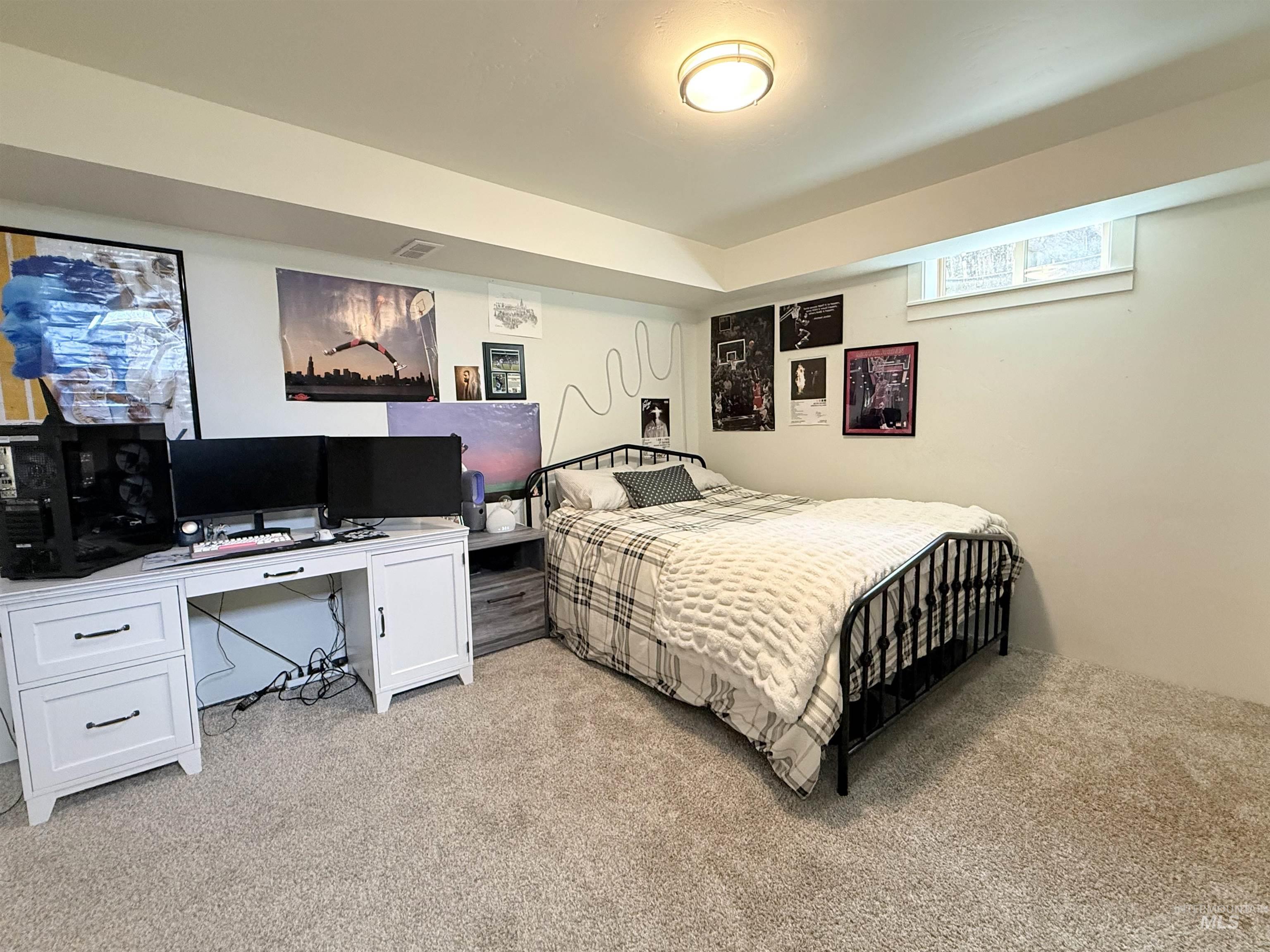 624 20th Street Rupert, ID 83350 - Photo 26 of 31 Bedroom featuring light carpet and a desk