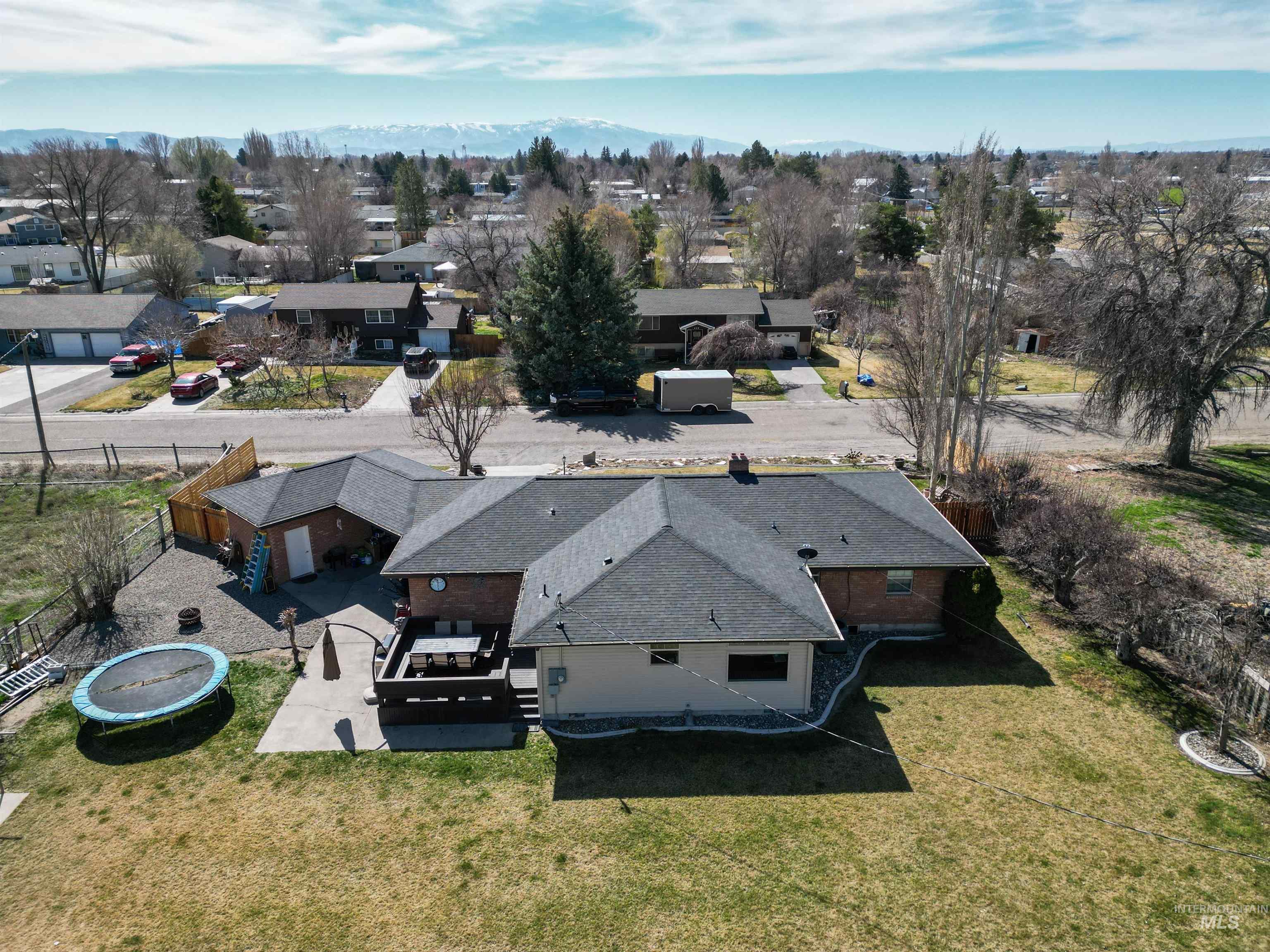 624 20th Street Rupert, ID 83350 - Photo 28 of 31 Aerial view of residential area featuring mountains