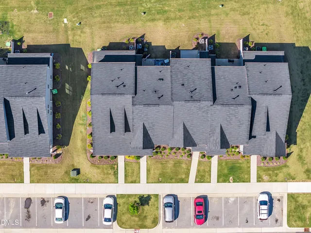 an aerial view of a swimming pool patio and mountain view