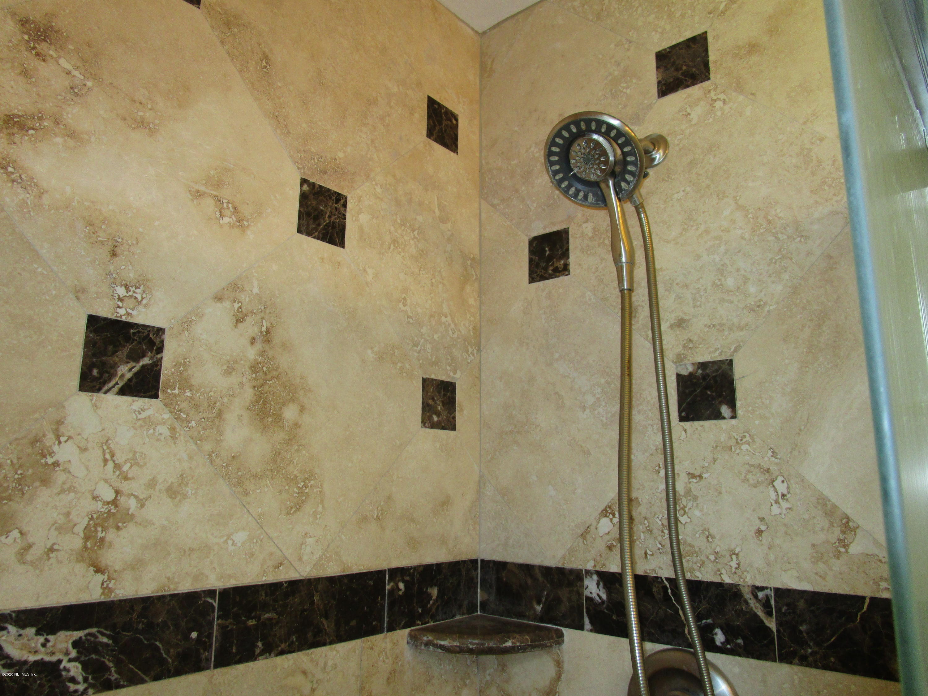 2544 Sam Road Jacksonville, FL 32216 - Photo 24 of 39 a bathroom with a shower