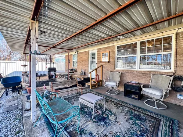 a building outdoor space with patio furniture