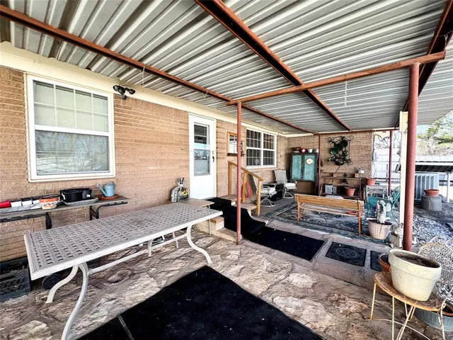 a outdoor living space with furniture and a couch