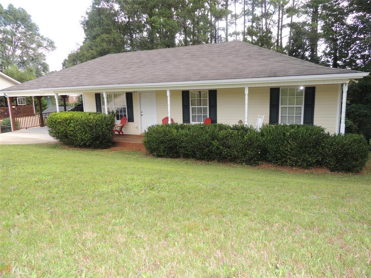 4087 Poplar Springs Road, Unit 32 Gainesville, GA 30507 - Photo 1 of 1 a view of a house with garden and yard