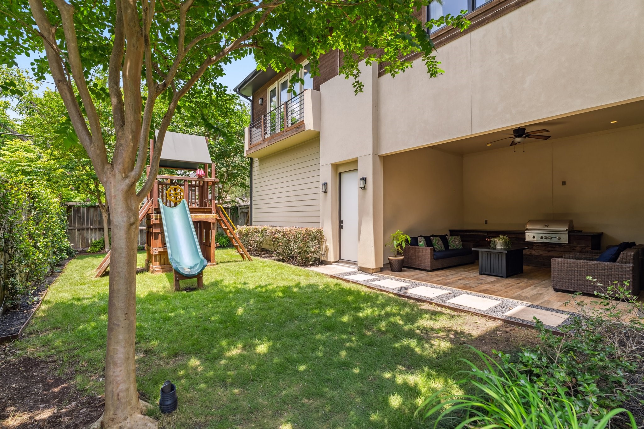 815 East 27th Street Houston, TX 77009 - Photo 33 of 44 This incredible fenced in and pool-sized backyard provides ample green space for kids and pets to play as well as a large covered patio with outdoor kitchen for entertaining and relaxing.