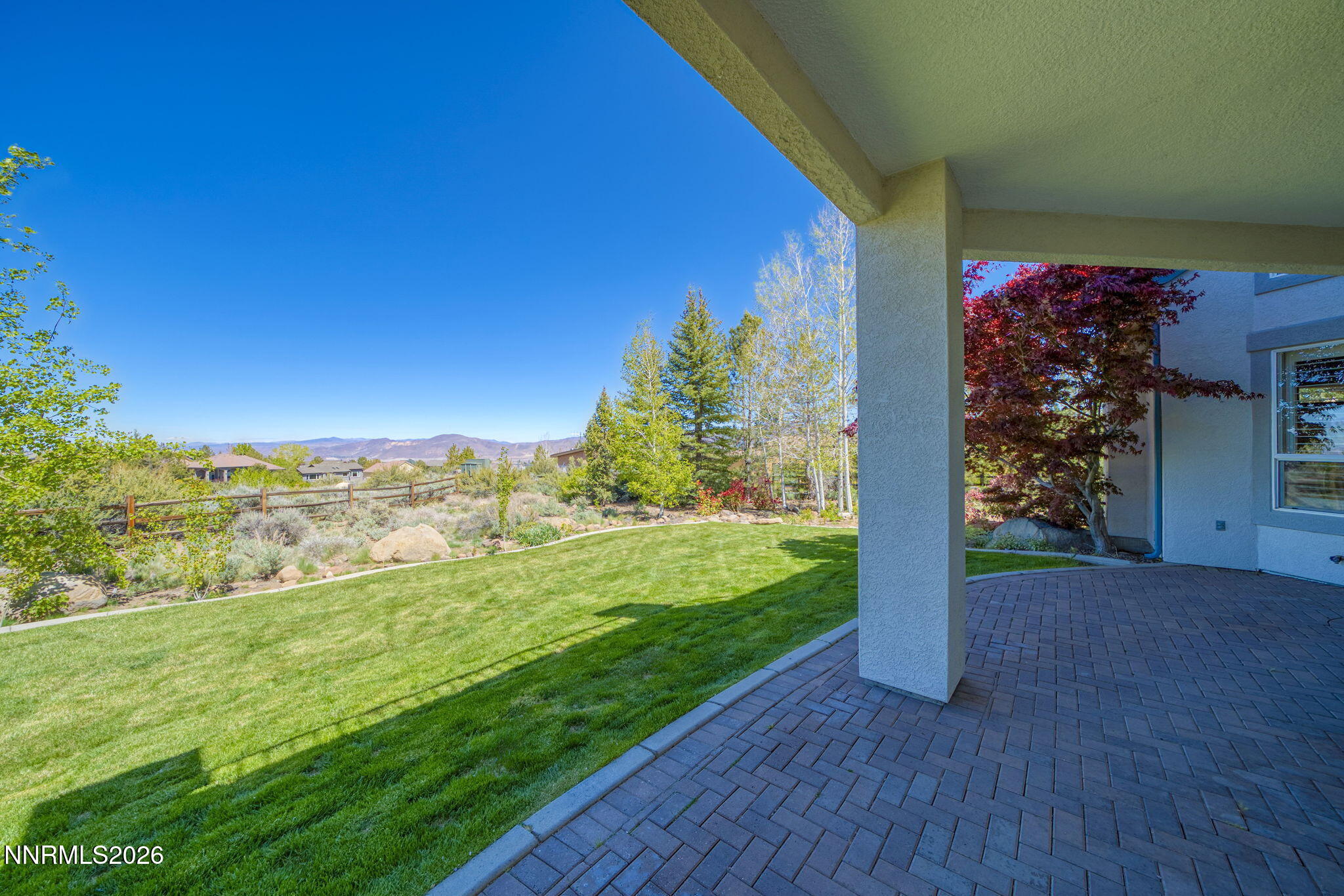 3965 Lake Placid Drive Reno, NV 89511 - Photo 19 of 70 a view of a yard with an tree