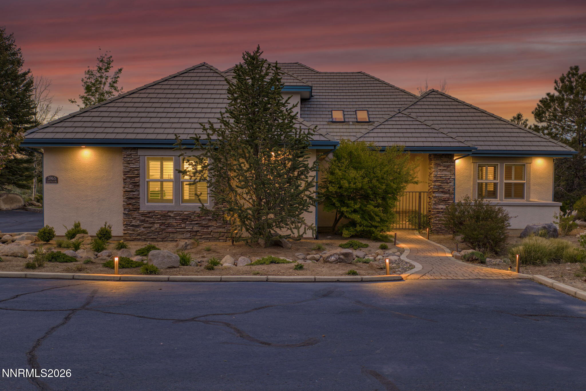 3965 Lake Placid Drive Reno, NV 89511 - Photo 2 of 70 a front view of a house with a yard