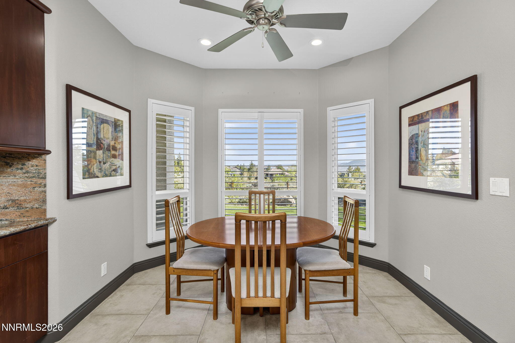 3965 Lake Placid Drive Reno, NV 89511 - Photo 36 of 70 a view of a dining room with furniture window and wooden floor