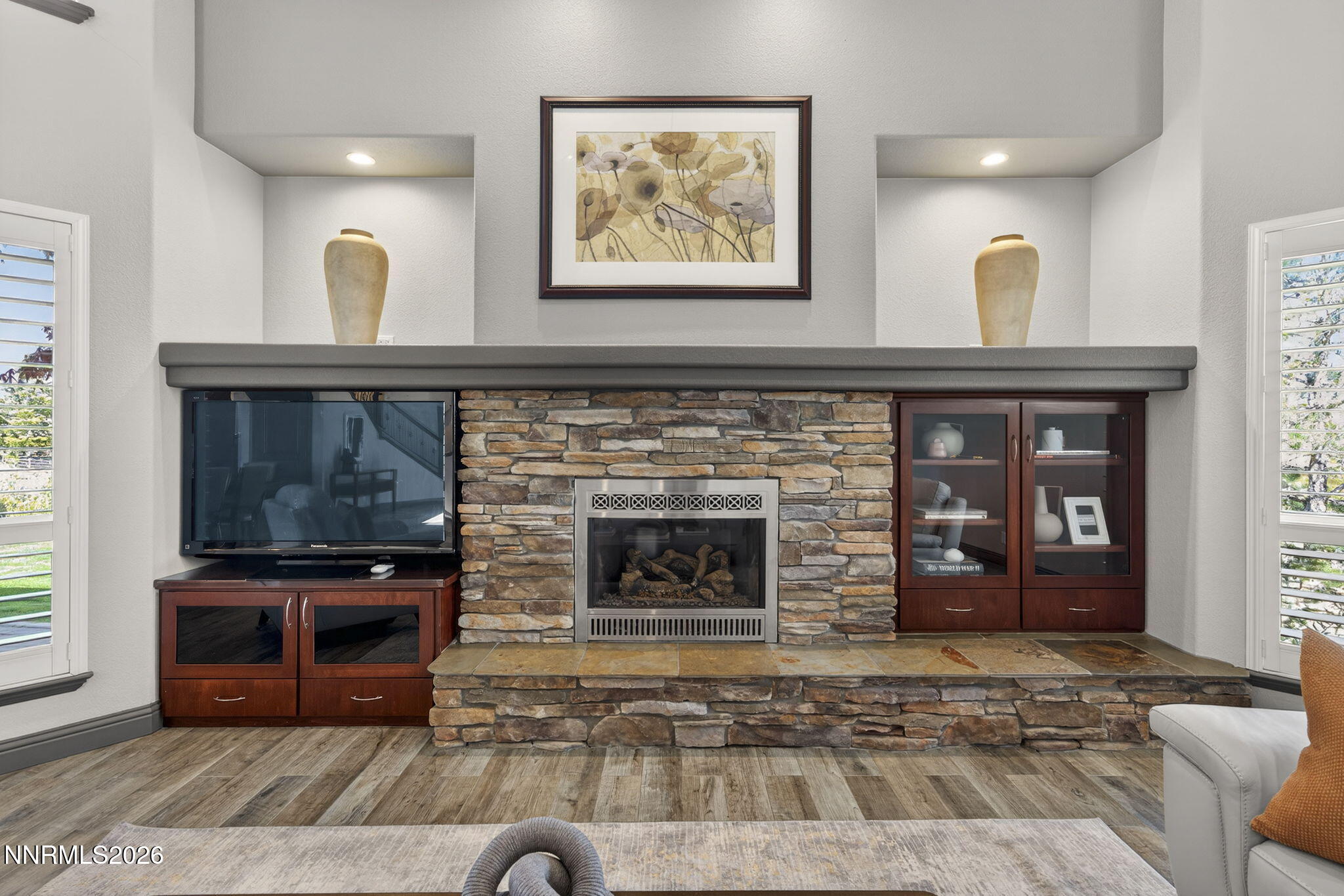 3965 Lake Placid Drive Reno, NV 89511 - Photo 38 of 70 a living room with furniture and a fireplace