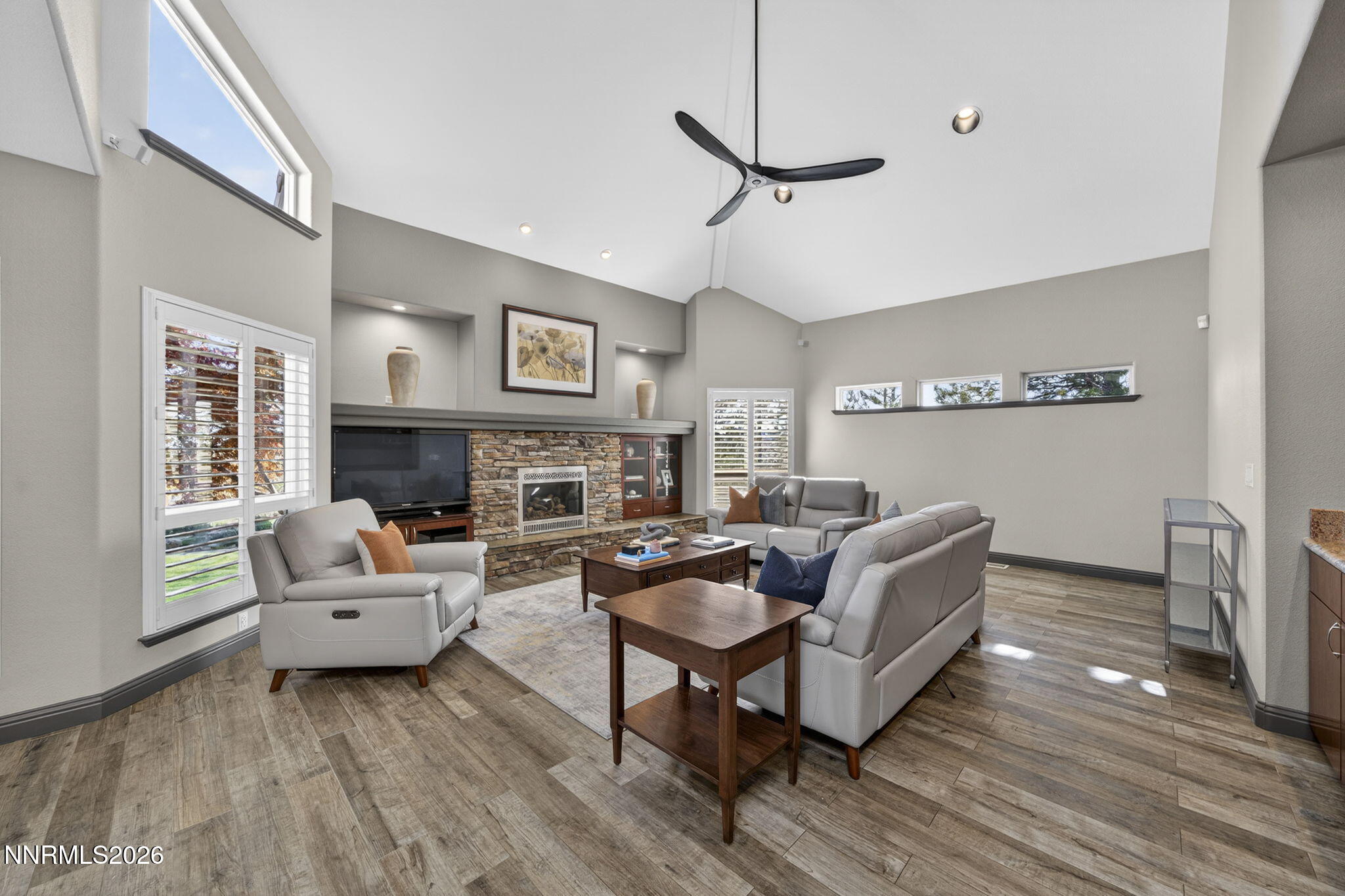 3965 Lake Placid Drive Reno, NV 89511 - Photo 44 of 70 a living room with furniture and a fireplace