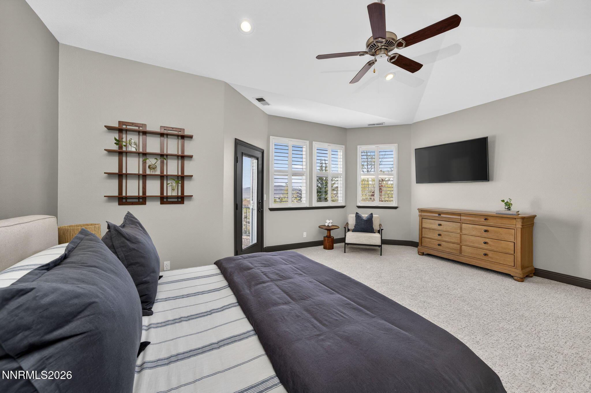 3965 Lake Placid Drive Reno, NV 89511 - Photo 54 of 70 a living room with furniture and a flat screen tv