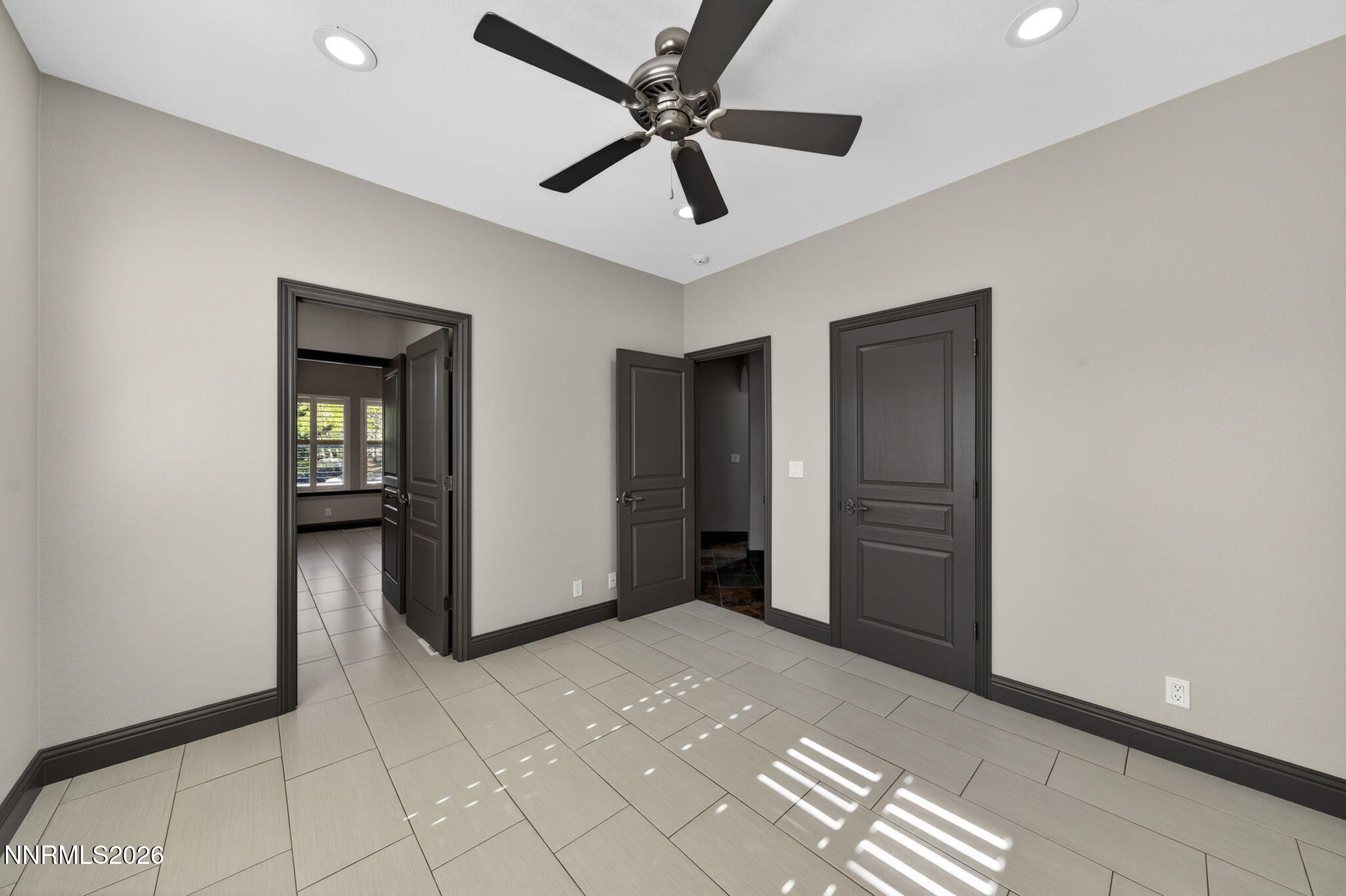 3965 Lake Placid Drive Reno, NV 89511 - Photo 66 of 70 a view of a livingroom with a ceiling fan and window