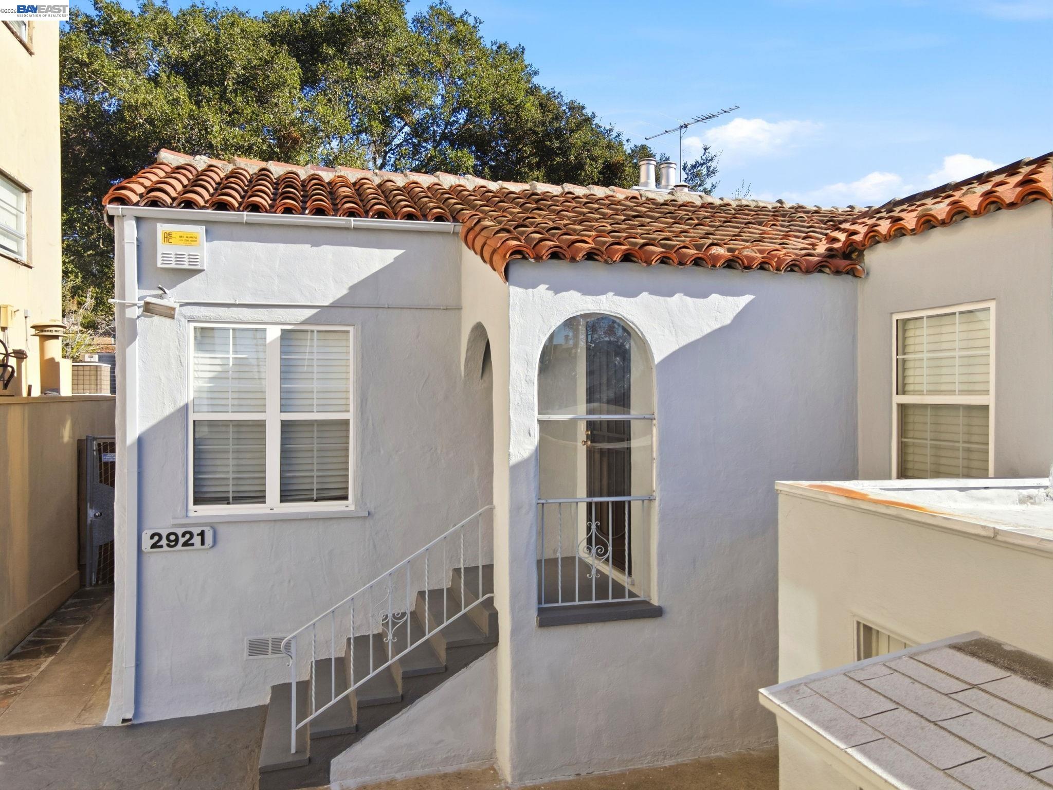 2917 Telegraph Avenue Berkeley, CA 94705 - Photo 1 of 12 a front view of a house with a yard