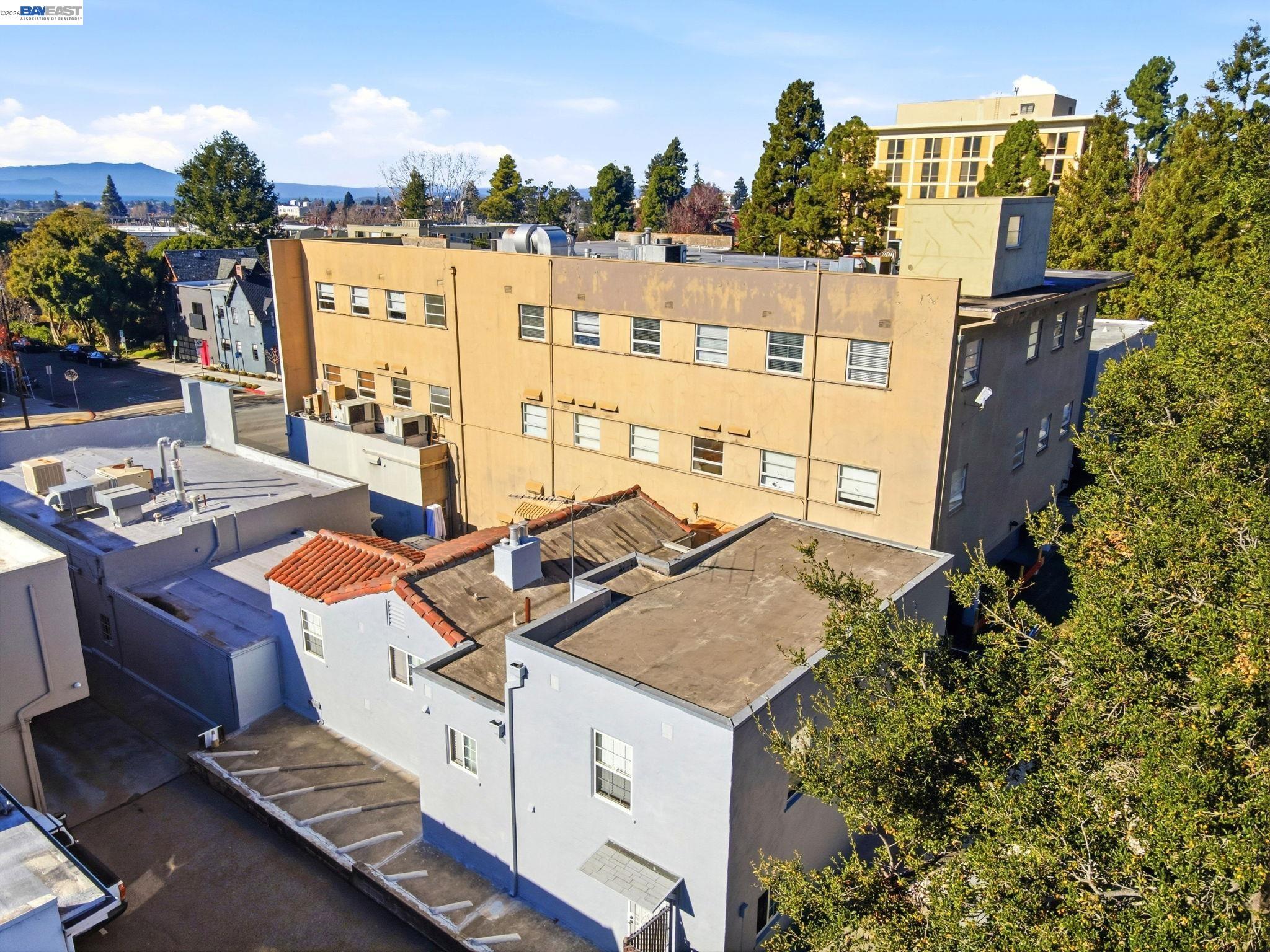 2917 Telegraph Avenue Berkeley, CA 94705 - Photo 2 of 12 a view of a balcony with chairs and a stove