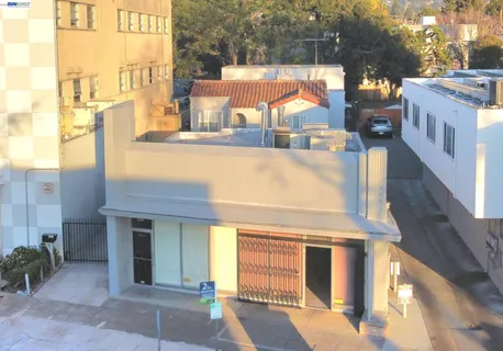 a view of a building with a tree
