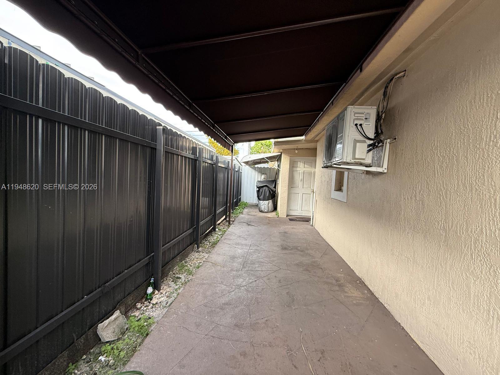 411 West 31st Place, Unit 2 Hialeah, FL 33012 - Photo 1 of 6 a view of a pathway