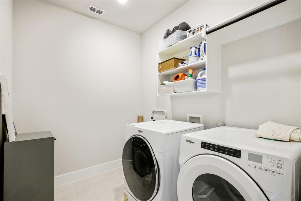 4502 Smokey Quartz Lane Arlington, TX 76005 - Photo 26 of 32 a utility room with dryer and washer