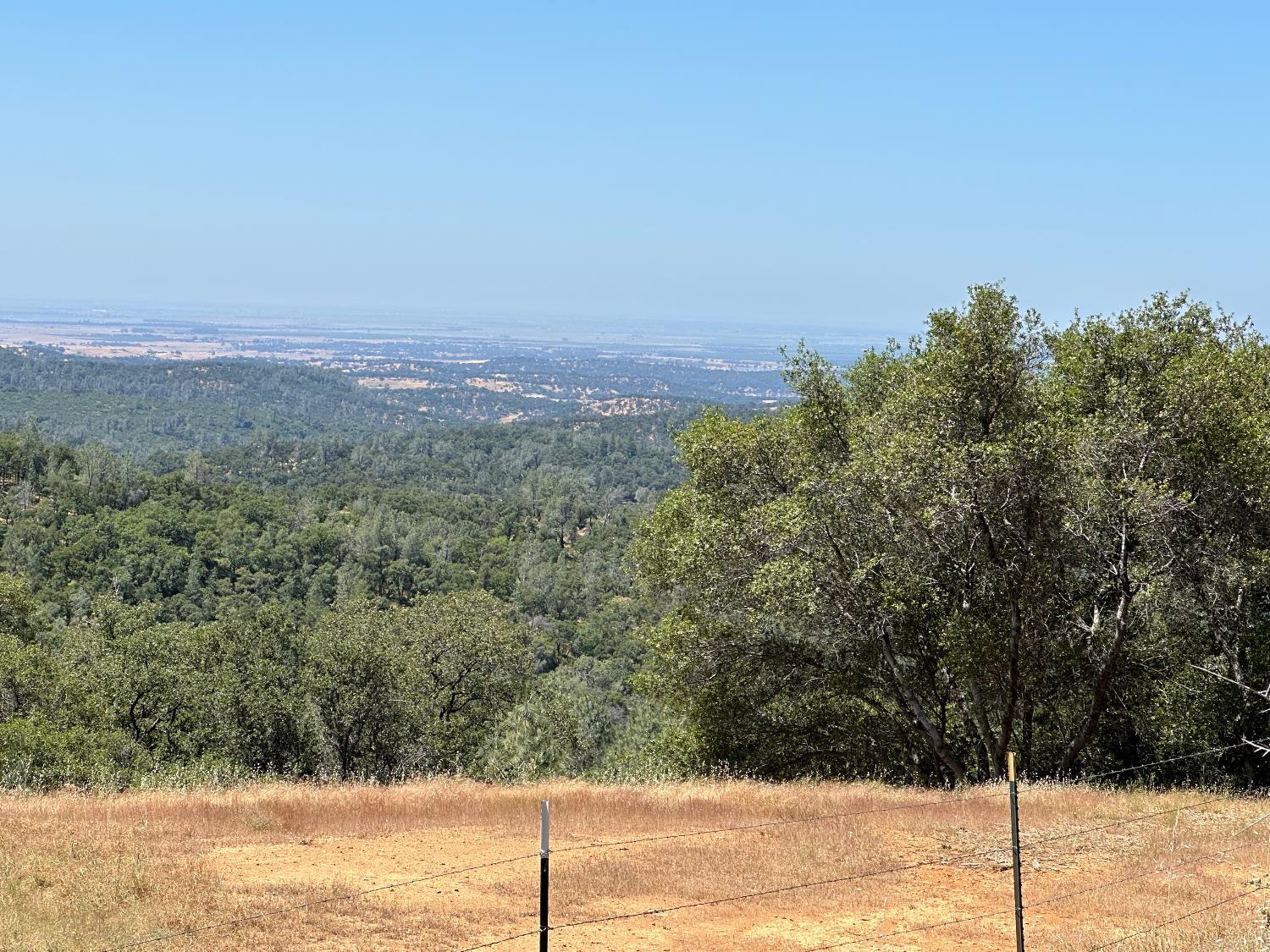 14210 Perimeter Road Grass Valley, CA 95949 - Photo 27 of 33 a view of a yard with an ocean