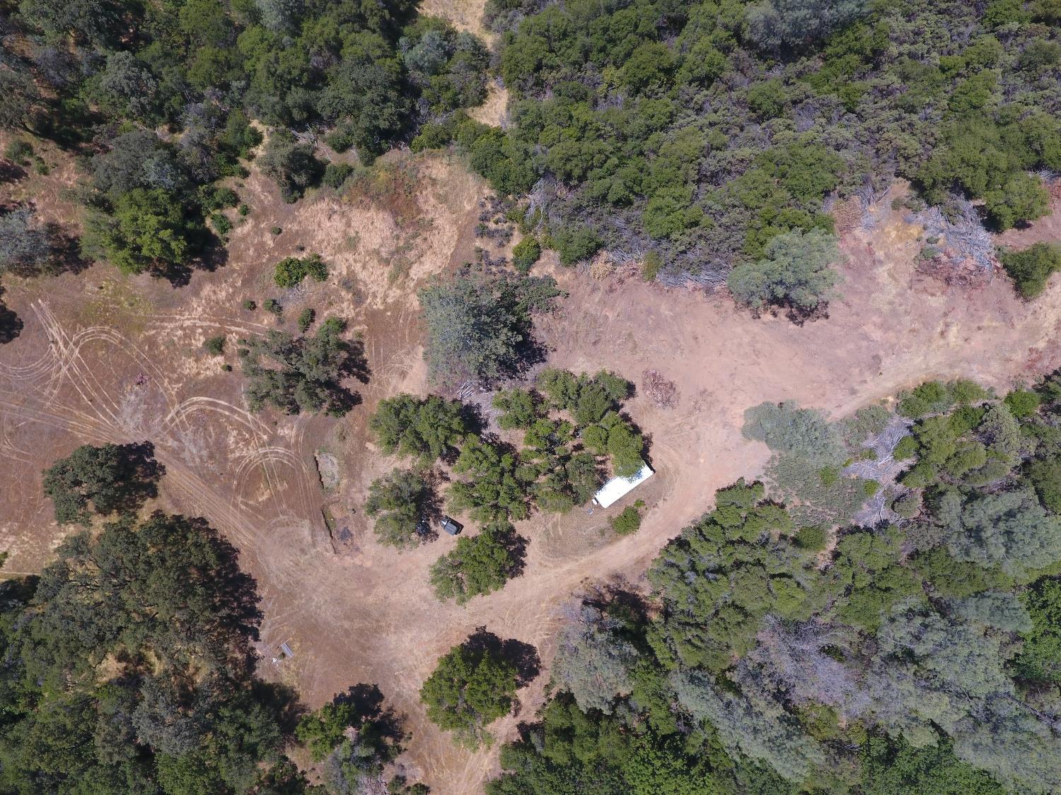 14210 Perimeter Road Grass Valley, CA 95949 - Photo 8 of 33 an aerial view of a house with a yard