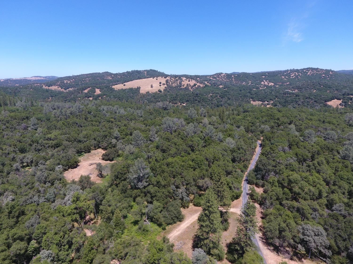 14210 Perimeter Road Grass Valley, CA 95949 - Photo 10 of 33 a view of a mountain in the distance