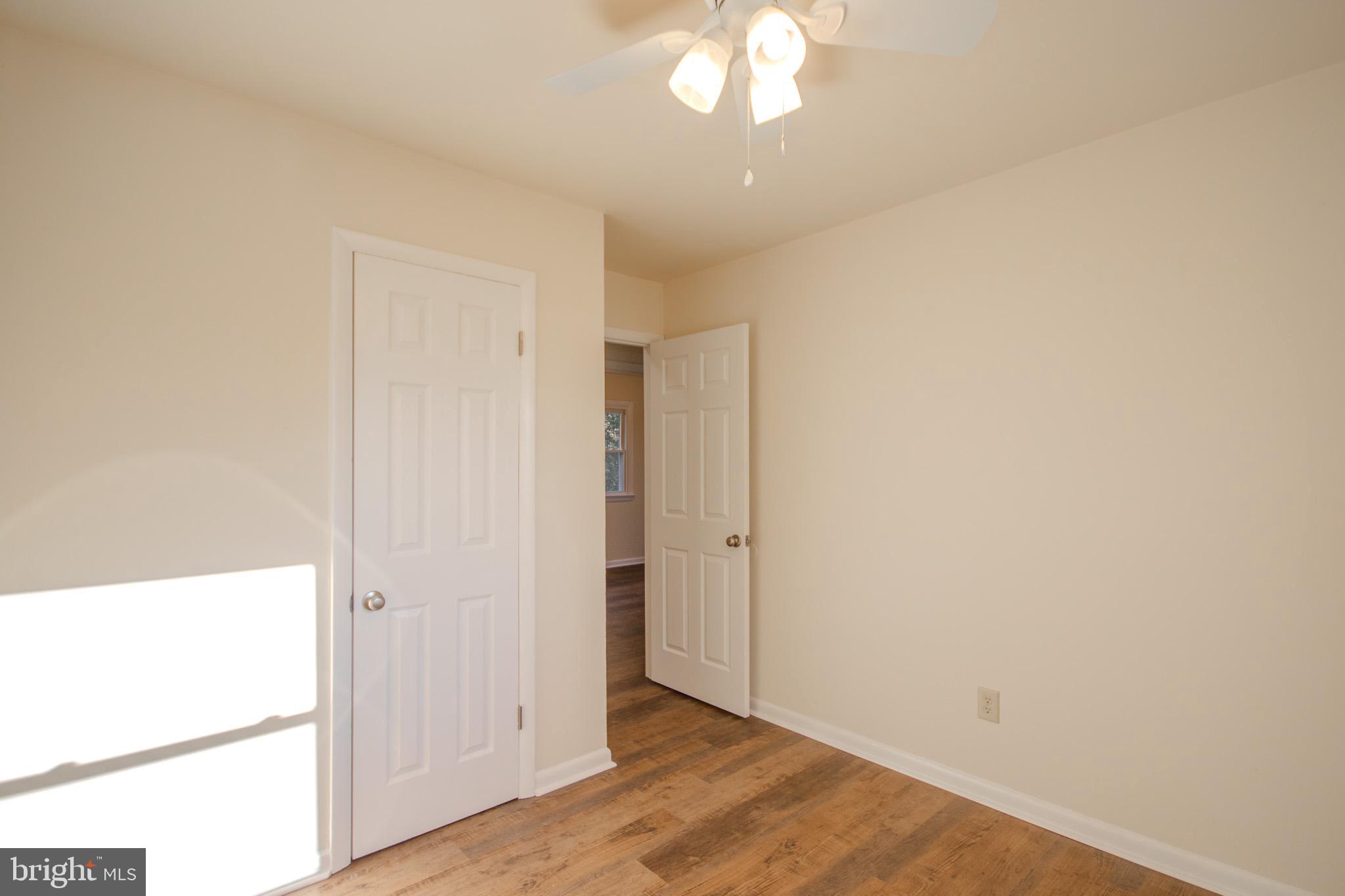 306 Autumn Terrace Salisbury, MD 21804 - Photo 11 of 21 an empty room with wooden floor