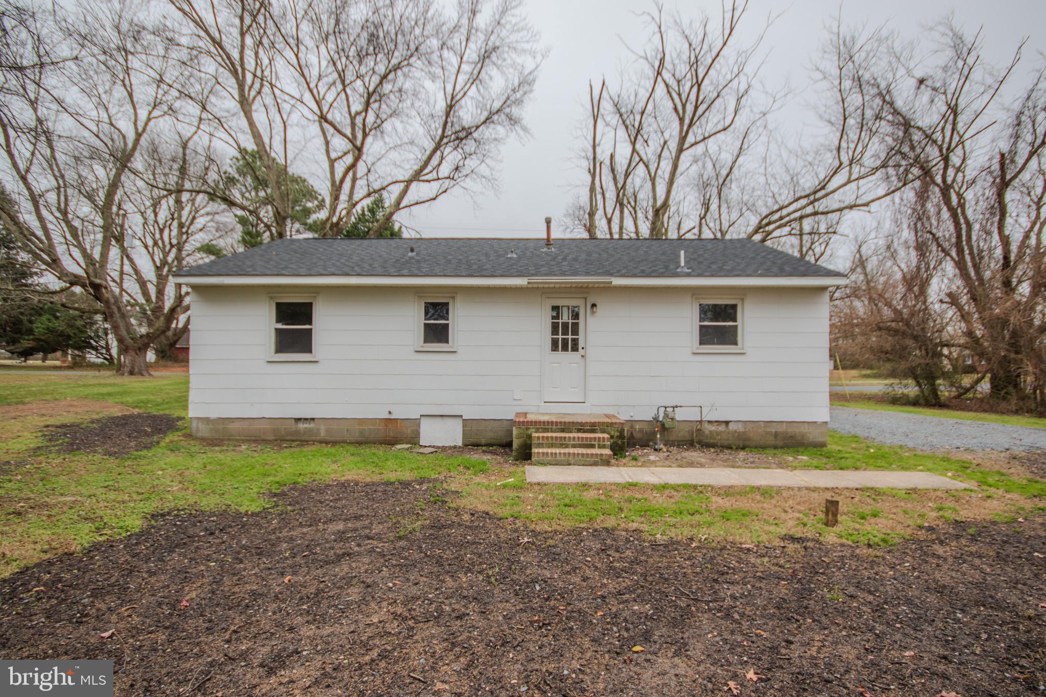 306 Autumn Terrace Salisbury, MD 21804 - Photo 19 of 21 a backyard of a house with garden and outdoor seating