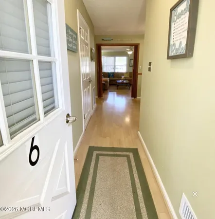 a view of balcony with furniture