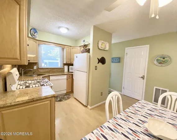 a bedroom with a bed and dresser