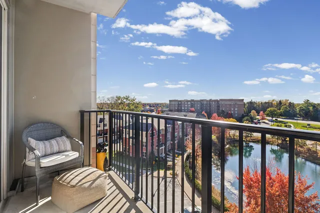 a view of balcony with furniture