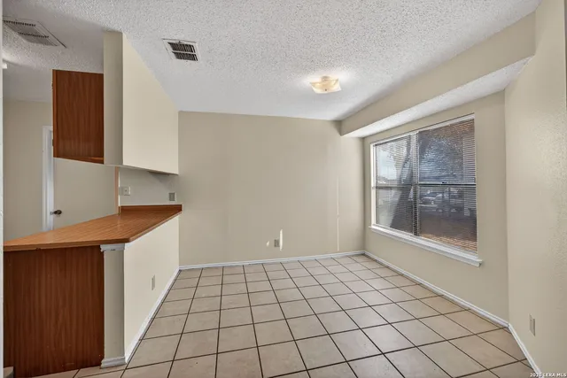 a view of an empty room with window