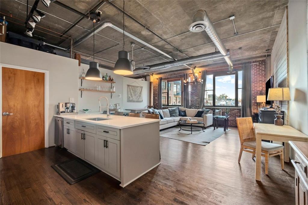 a view of a kitchen with appliances and cabinets