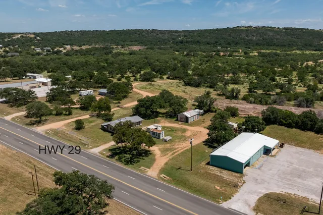 an aerial view of residential house and lake view