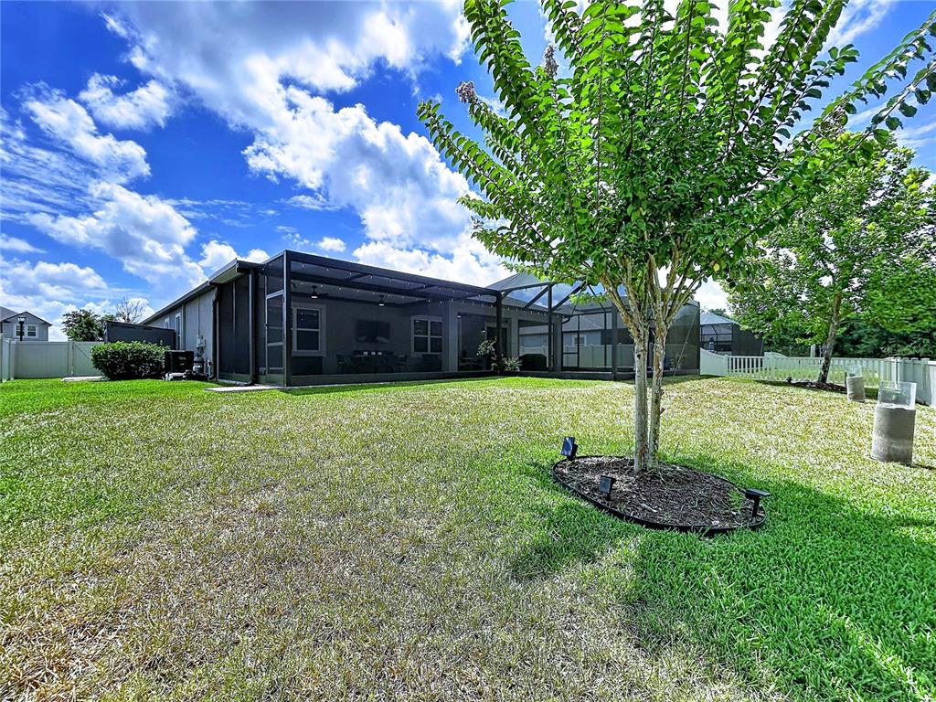 18078 Romanesque Court Spring Hill, FL 34610 - Photo 69 of 81 a view of a house with a yard