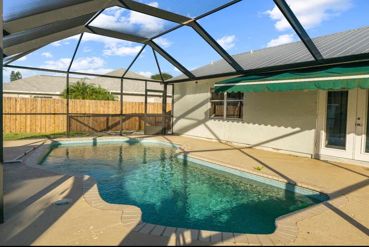 2230 Southeast Dill Lane Port St. Lucie, FL 34952 - Photo 1 of 15 a view of a backyard