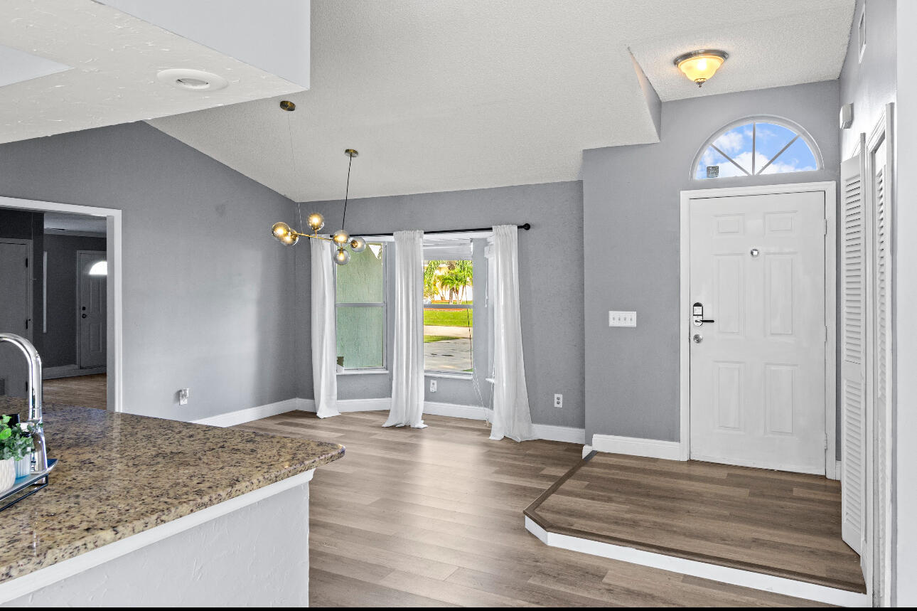 2230 Southeast Dill Lane Port St. Lucie, FL 34952 - Photo 12 of 15 a view of an entryway door and hallway