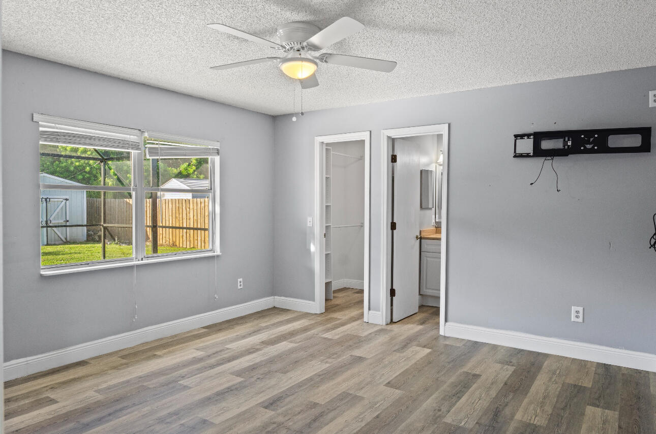 2230 Southeast Dill Lane Port St. Lucie, FL 34952 - Photo 8 of 15 a view of an empty room with a window