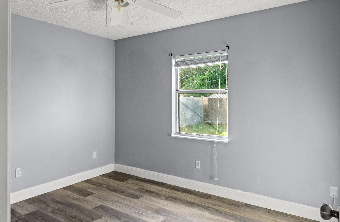 2230 Southeast Dill Lane Port St. Lucie, FL 34952 - Photo 10 of 15 an empty room with a window