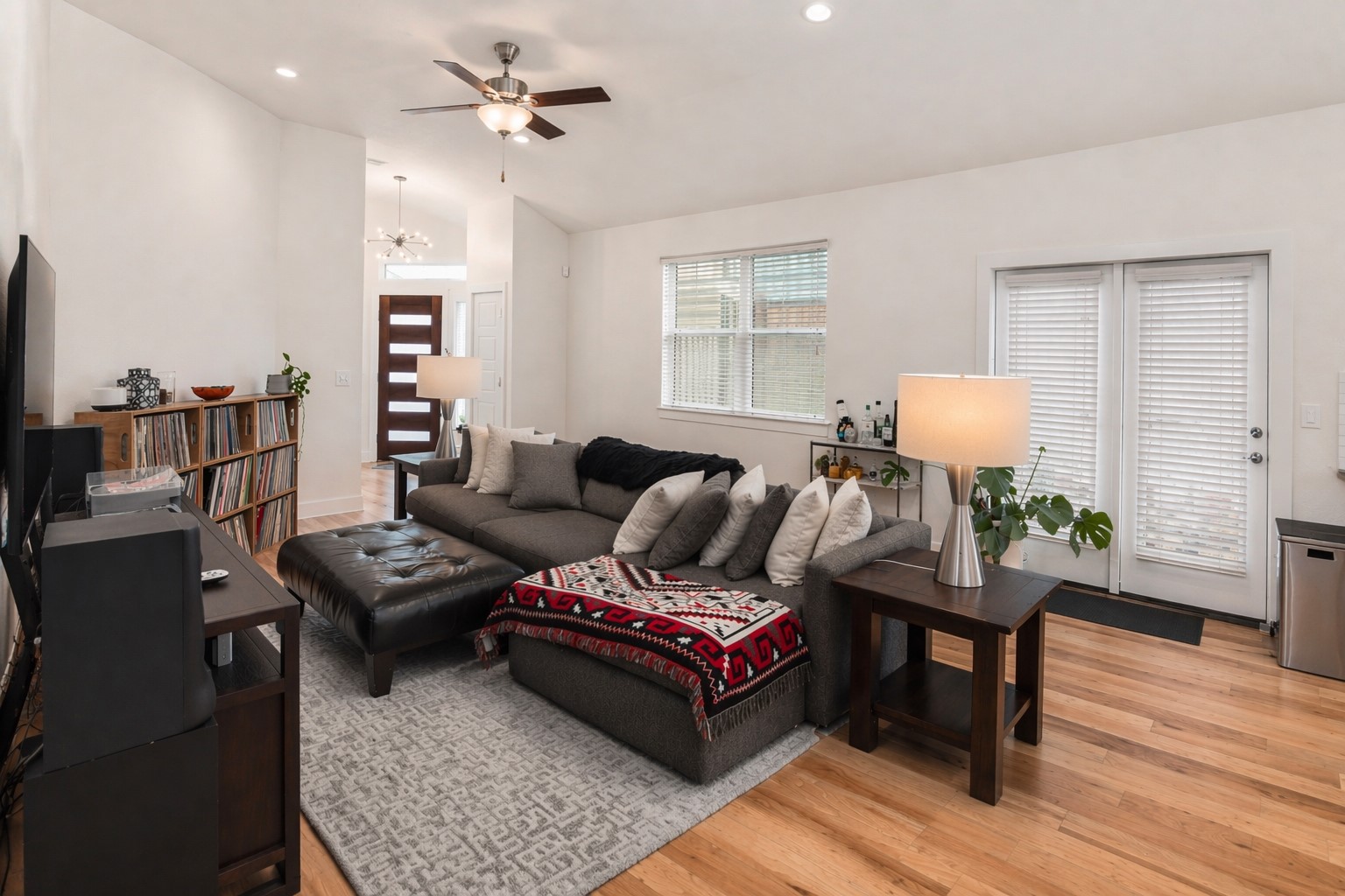 2100 Hermia Street, Unit 41 Austin, TX 78741 - Photo 4 of 22 a living room with furniture a wooden floor and a window