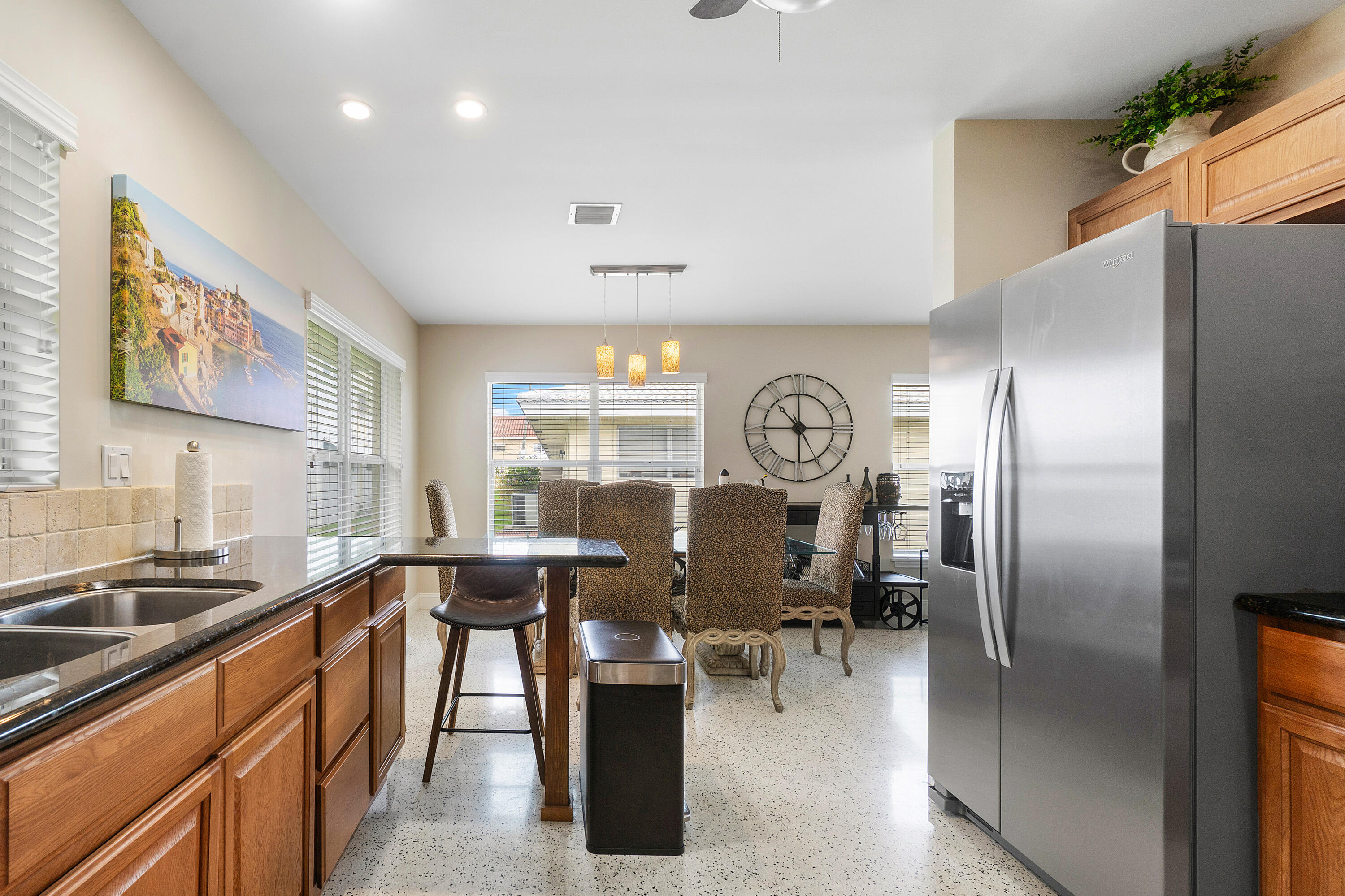 2757 Northeast 29th Avenue, Unit 2 Lighthouse Point, FL 33064 - Photo 11 of 29 a kitchen with lots of counter top space
