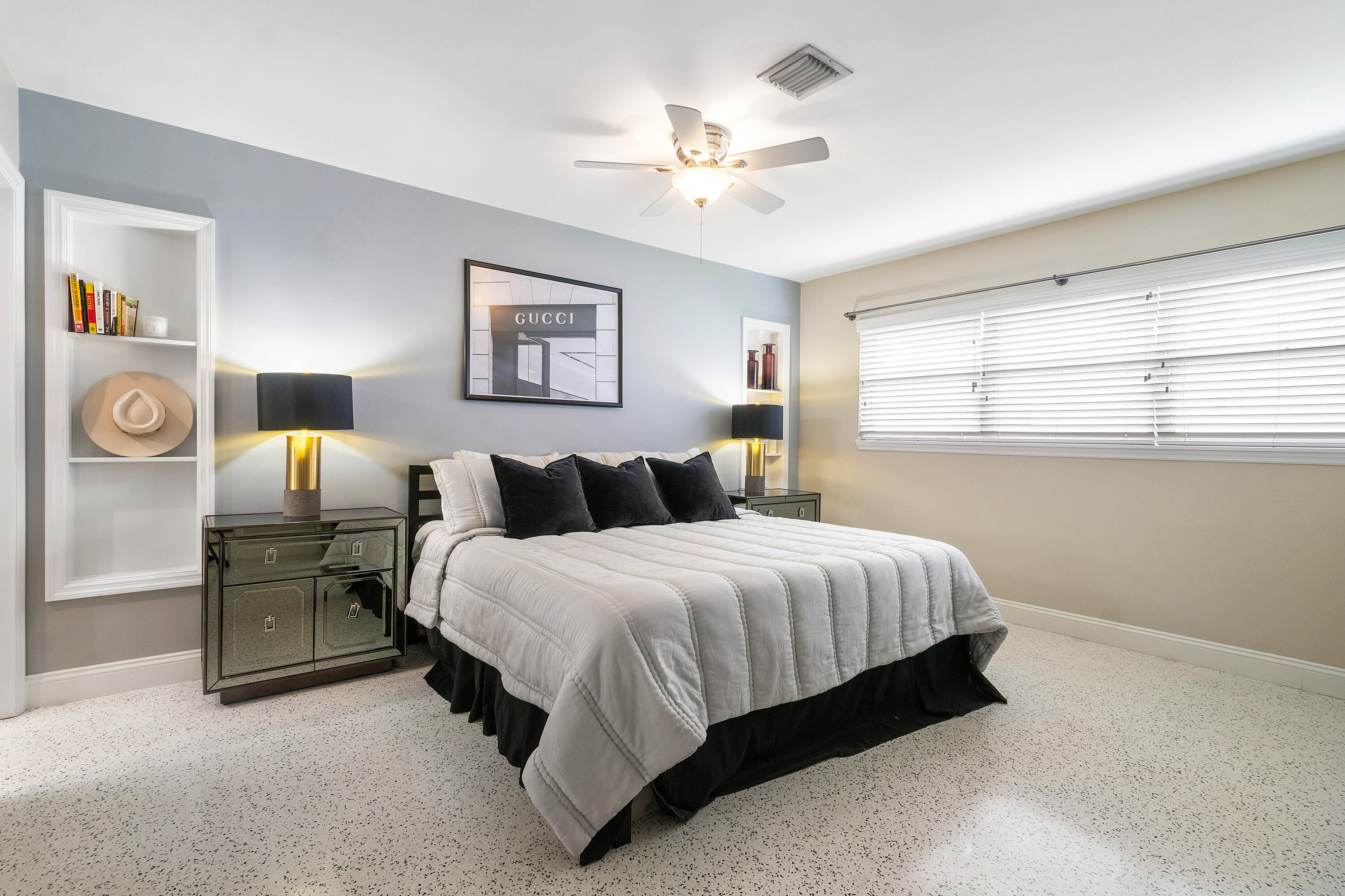 2757 Northeast 29th Avenue, Unit 2 Lighthouse Point, FL 33064 - Photo 16 of 29 a spacious bedroom with a bed and window