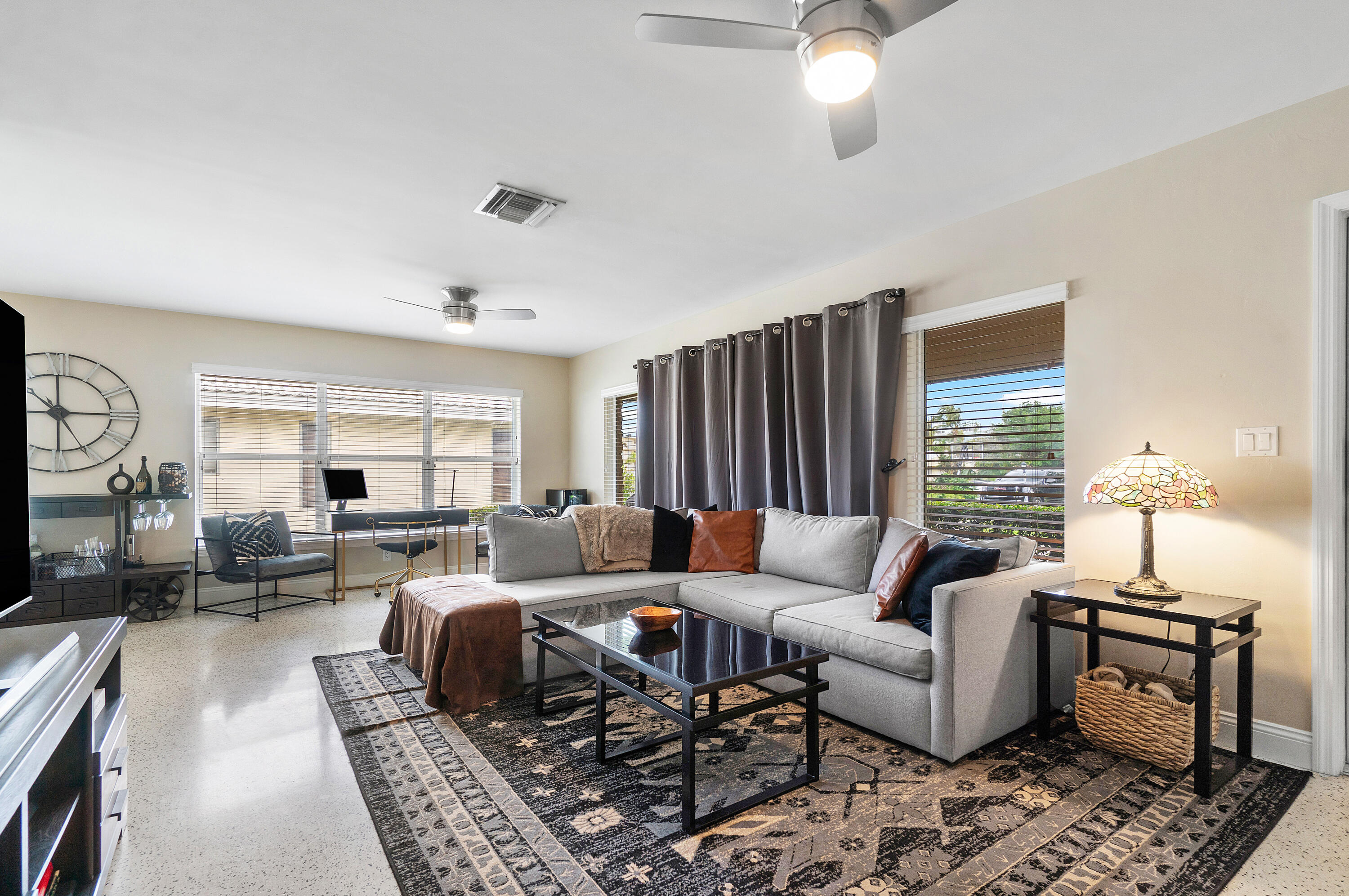 2757 Northeast 29th Avenue, Unit 2 Lighthouse Point, FL 33064 - Photo 7 of 29 a living room with furniture and a large window