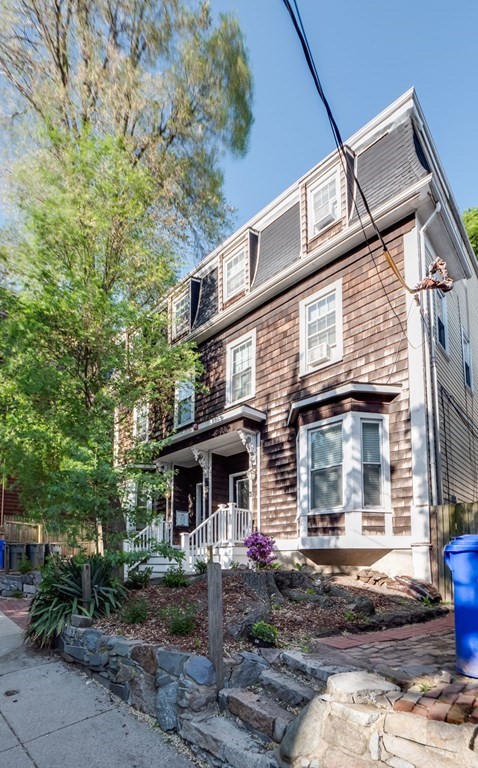 28 Mercer Street, Unit 2 Boston, MA 02127 - Photo 19 of 23 a front view of a house with garden