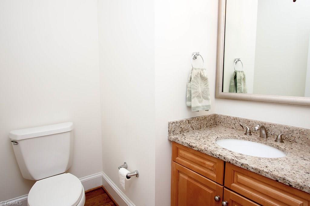 6104 Gwynedd Road Summerfield, NC 27358 - Photo 12 of 30 Powder room off kitchen area.