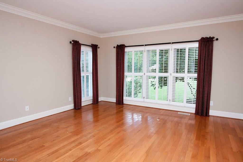 6104 Gwynedd Road Summerfield, NC 27358 - Photo 13 of 30 Main floor master. Private, spacious and restful, a true oasis.