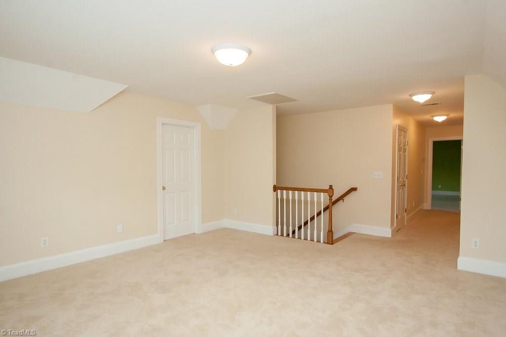 6104 Gwynedd Road Summerfield, NC 27358 - Photo 19 of 30 Upstairs bonus. Great for video games/TV or quiet sitting room.
