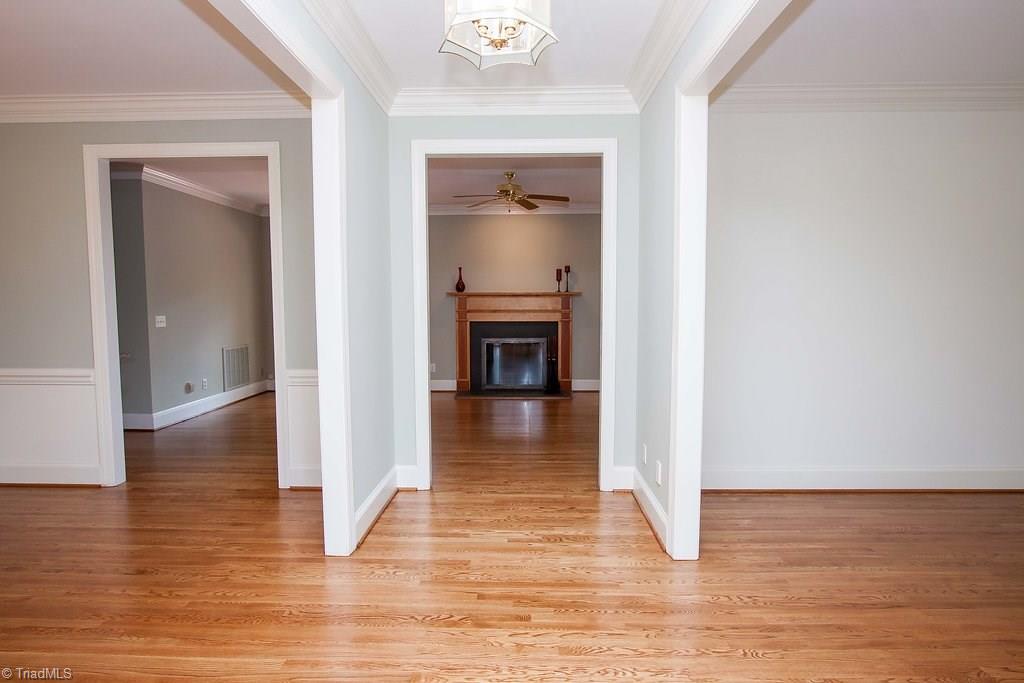 6104 Gwynedd Road Summerfield, NC 27358 - Photo 30 of 30 Wide halls, gleaming floors and detailed molding define this floor plan.