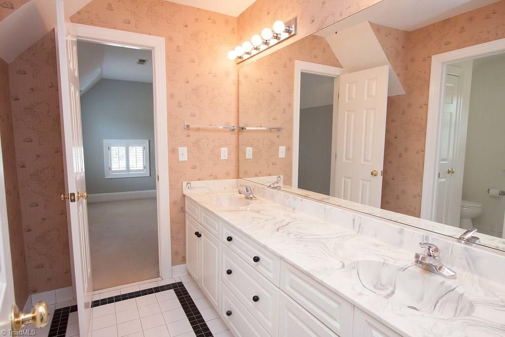 6104 Gwynedd Road Summerfield, NC 27358 - Photo 21 of 30 Jack and jill bath, located upstairs.