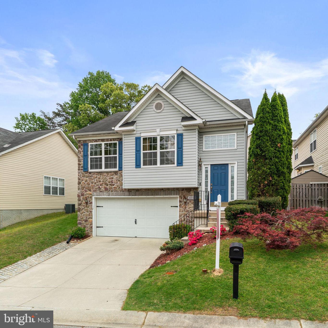 8057 Mayer Avenue Pasadena, MD 21122 - Photo 1 of 26 a front view of house with yard and green space