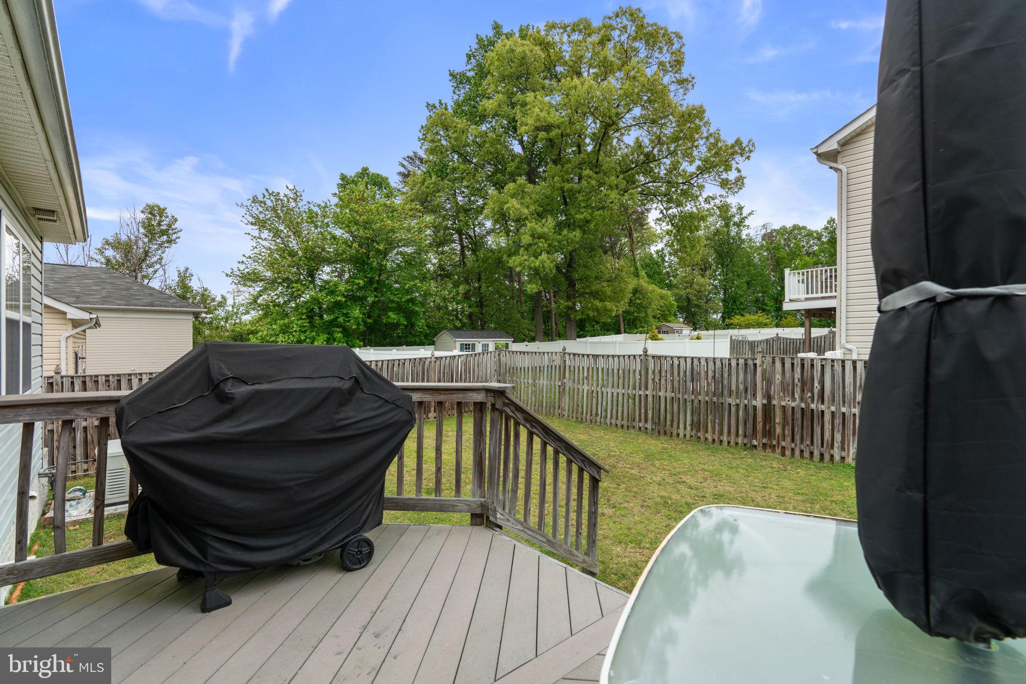 8057 Mayer Avenue Pasadena, MD 21122 - Photo 25 of 26 a view of deck with patio