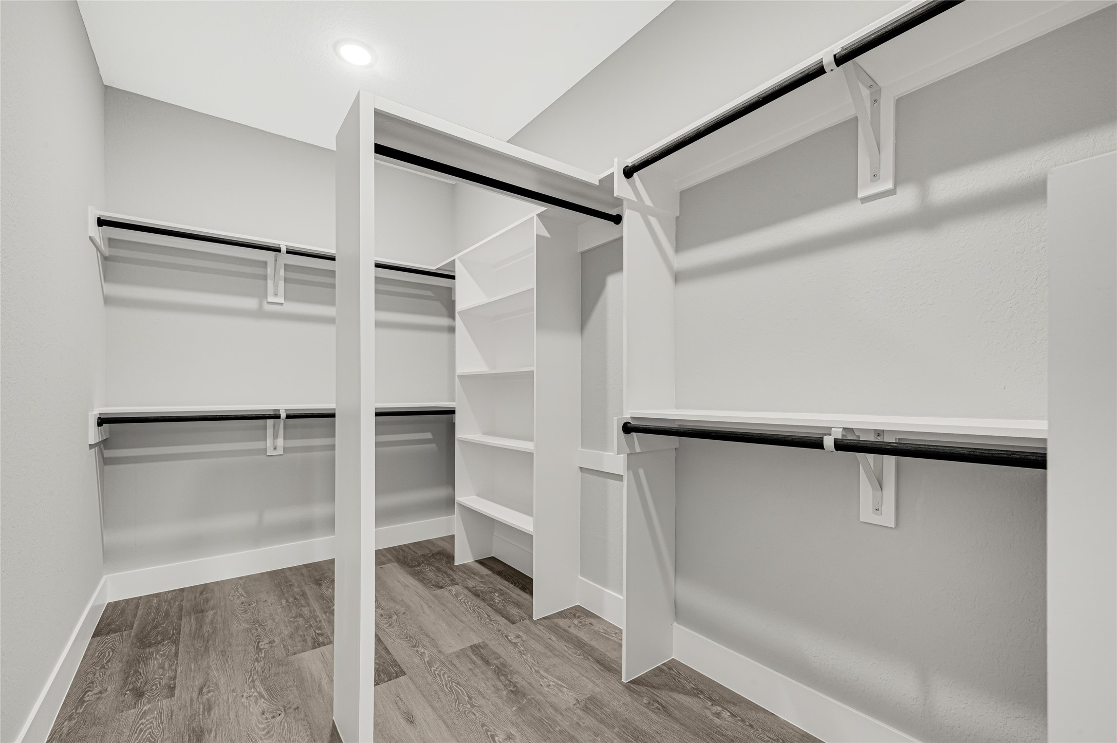 5930 Boness Road, Unit A & B Houston, TX 77396 - Photo 25 of 43 Spacious master bedroom walk-in closet featuring custom-built shelving and organizers.